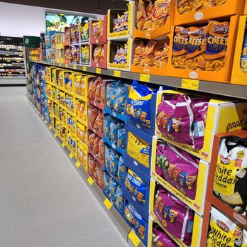 ALDI - a grocery store aisle filled with snacks - Grocery Near Me - Shirley, New York