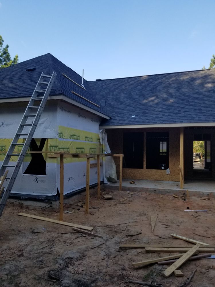 Slide of Red Bull Roofing Solutions