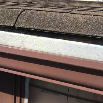 Roswell Gutter Cleaning & Installation - told was completed rotted out and needed to replaced. As you can see it is distressed but fine. - Gutter Services Near Me