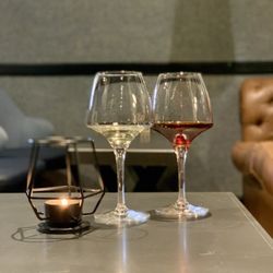 Loki Wine Merchant & Tasting House - A taste of the Gewürztraminer, a larger taste of the Australian port. Both delightful. Upstairs seating.