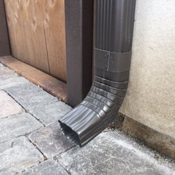 Donco Custom Screen & Continuous Rain Gutters - We chose a dark bronze color that contrasts well with the white of our house