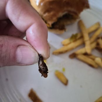 Jack Astor's - This is how thick my kids burger was. Cheese was thicker and it was burnt black. Garbage - Sports Bars Near Me - London, Ontario Jack Astor's - This is how thick my kids burger was. Cheese was thicker and it was burnt black. Garbage - Sports Bars Near Me - London, Ontario