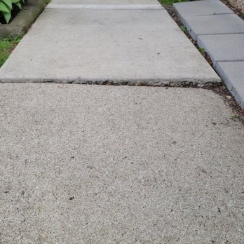 Accurate Concrete Raising - Before. Sinking on the right side over an inch - Masonry/Concrete Near Me