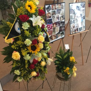 Sherri's Floral Shoppe - Should not be any carnations or sunflowers. Should have palm frond backing. - Florists Near Me - Sebastian, Florida Sherri's Floral Shoppe - Should not be any carnations or sunflowers. Should have palm frond backing. - Florists Near Me - Sebastian, Florida