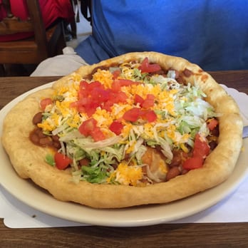 Amigo Cafe - Navajo taco in fry bread. Delicious but it has no chicken or meat so ask to add that if you wish. - Mexican Near Me - Kayenta, Arizona Amigo Cafe - Navajo taco in fry bread. Delicious but it has no chicken or meat so ask to add that if you wish. - Mexican Near Me - Kayenta, Arizona