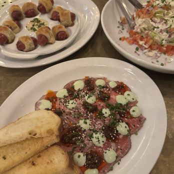 Brass Ram - Carpaccio, waygu pigs in a blanket and wedge salad. All top tier delicious - New American Near Me - Dallas, Texas Brass Ram - Carpaccio, waygu pigs in a blanket and wedge salad. All top tier delicious - New American Near Me - Dallas, Texas