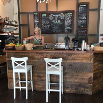 Mayanjali - a woman preparing food at a restaurant counter - Juice Bars & Smoothies Near Me - Key West, Florida Mayanjali - a woman preparing food at a restaurant counter - Juice Bars & Smoothies Near Me - Key West, Florida
