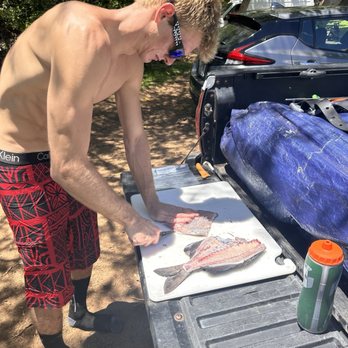 Valley Isle Spearfishing - Cleaning fish caught after a successful morning Spearfishing. - Fishing Near Me Valley Isle Spearfishing - Cleaning fish caught after a successful morning Spearfishing. - Fishing Near Me