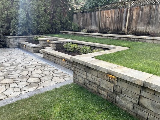 Retaining Wall Construction - Our retaining wall construction service can help homeowners create a beautiful and functional outdoor space. We can build walls of various shapes and sizes, using a variety of materials, to suit your needs and budget. There are many reasons why you should book a retaining wall construction service provided by Dahl's Landscape & Design. We have the experience and expertise to build retaining walls that will not only look great, but will also be durable and long lasting.
We use only the highest quality materials in our retaining walls, and we have a wide variety of options to choose from, so you can find the perfect wall for your needs. We also offer a wide range of colors and textures to choose from, so you can create a wall that perfectly matches your home's décor.
Our retaining walls are also designed to be very durable and to withstand even the most severe weather conditions. We back our walls with a lifetime guarantee, so you can be sure they will last for many years.
If you are interested in booking a retaining wall construction service provided by Dahl's Landscape & Design, please contact us today. We would be happy to answer any questions you may have or provide you with a free consultation.
If you're thinking about installing a retaining wall in your backyard, Dahl's Landscape & Design can help! We offer professional Retaining Wall Construction services that will make your backyard look amazing. Our experienced contractors will work with you to choose the right material and design for your needs and budget. We'll also take care of all the necessary excavation and installation work so you can relax and enjoy your new backyard oasis! Retaining Wall Construction - Our retaining wall construction service can help homeowners create a beautiful and functional outdoor space. We can build walls of various shapes and sizes, using a variety of materials, to suit your needs and budget. There are many reasons why you should book a retaining wall construction service provided by Dahl's Landscape & Design. We have the experience and expertise to build retaining walls that will not only look great, but will also be durable and long lasting.
We use only the highest quality materials in our retaining walls, and we have a wide variety of options to choose from, so you can find the perfect wall for your needs. We also offer a wide range of colors and textures to choose from, so you can create a wall that perfectly matches your home's décor.
Our retaining walls are also designed to be very durable and to withstand even the most severe weather conditions. We back our walls with a lifetime guarantee, so you can be sure they will last for many years.
If you are interested in booking a retaining wall construction service provided by Dahl's Landscape & Design, please contact us today. We would be happy to answer any questions you may have or provide you with a free consultation.
If you're thinking about installing a retaining wall in your backyard, Dahl's Landscape & Design can help! We offer professional Retaining Wall Construction services that will make your backyard look amazing. Our experienced contractors will work with you to choose the right material and design for your needs and budget. We'll also take care of all the necessary excavation and installation work so you can relax and enjoy your new backyard oasis!