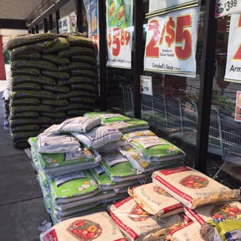Piggly Wiggly - a pile of bags of rice in front of a store - Grocery Near Me - Opelika, Alabama Piggly Wiggly - a pile of bags of rice in front of a store - Grocery Near Me - Opelika, Alabama