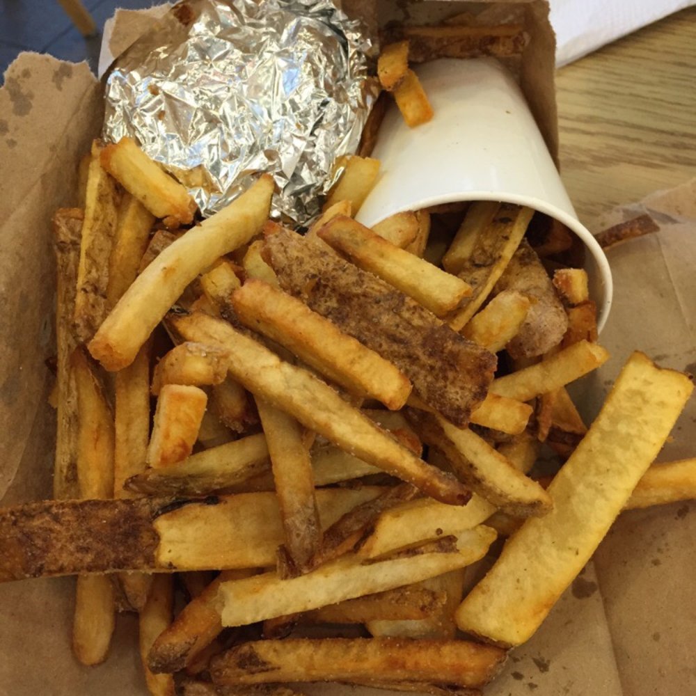 Five Guys - You get plenty of fries here. For context that "tiny" burger in the aluminum foil is a large double patty burger. - Burgers Near Me - Oklahoma City, Oklahoma Five Guys - You get plenty of fries here. For context that "tiny" burger in the aluminum foil is a large double patty burger. - Burgers Near Me - Oklahoma City, Oklahoma