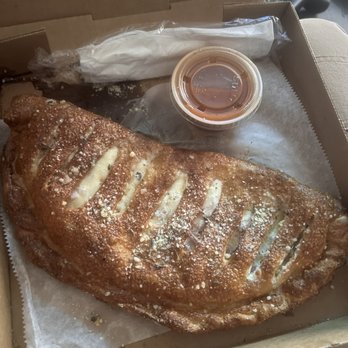 Aroma Pizza Company - Pretzel dough, cube cut ham calzone . It was also very flat and was mostly cheese. - Pizza Near Me - Lorton, Virginia Aroma Pizza Company - Pretzel dough, cube cut ham calzone . It was also very flat and was mostly cheese. - Pizza Near Me - Lorton, Virginia