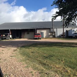 M K Meat Processing - Outside.  It's a meat processing place.  What do you expect?