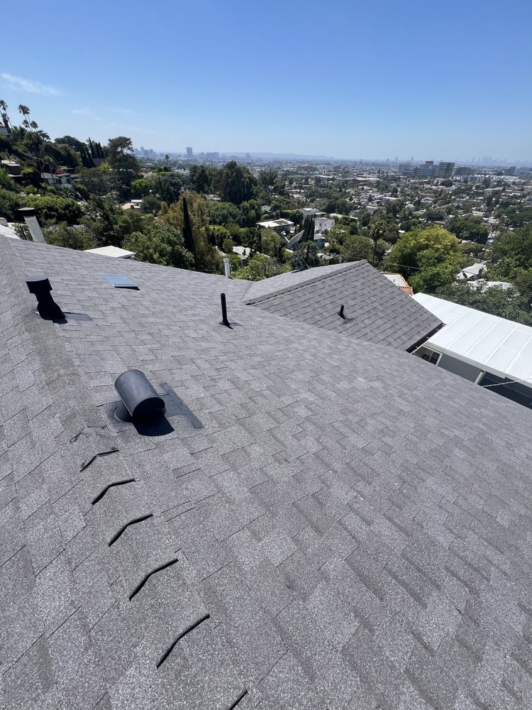Slide of Reign Roofing