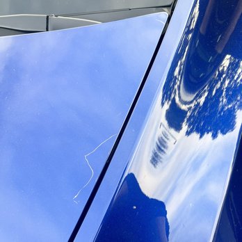 Tesla - Scratched hood and had nerve to call me and ask if I brought car in like this. - Car Dealers Near Me - Carlsbad, California