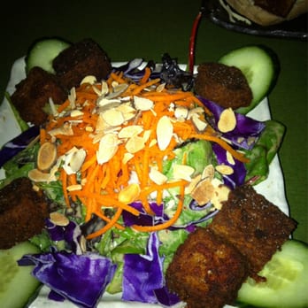 The Coup - Komodo Salad. Delicious dressing and spicy blackened tempeh croutons but i wish there was twice as much lettuce in a bowl - Vegetarian Near Me - Calgary, Alberta