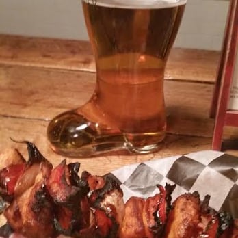 Bohemian Biergarten - Das boot of Bohemian IPA w/ chicken & bacon shashlyk, fries and apple BBQ sauce. - German Near Me - Boulder, Colorado Bohemian Biergarten - Das boot of Bohemian IPA w/ chicken & bacon shashlyk, fries and apple BBQ sauce. - German Near Me - Boulder, Colorado