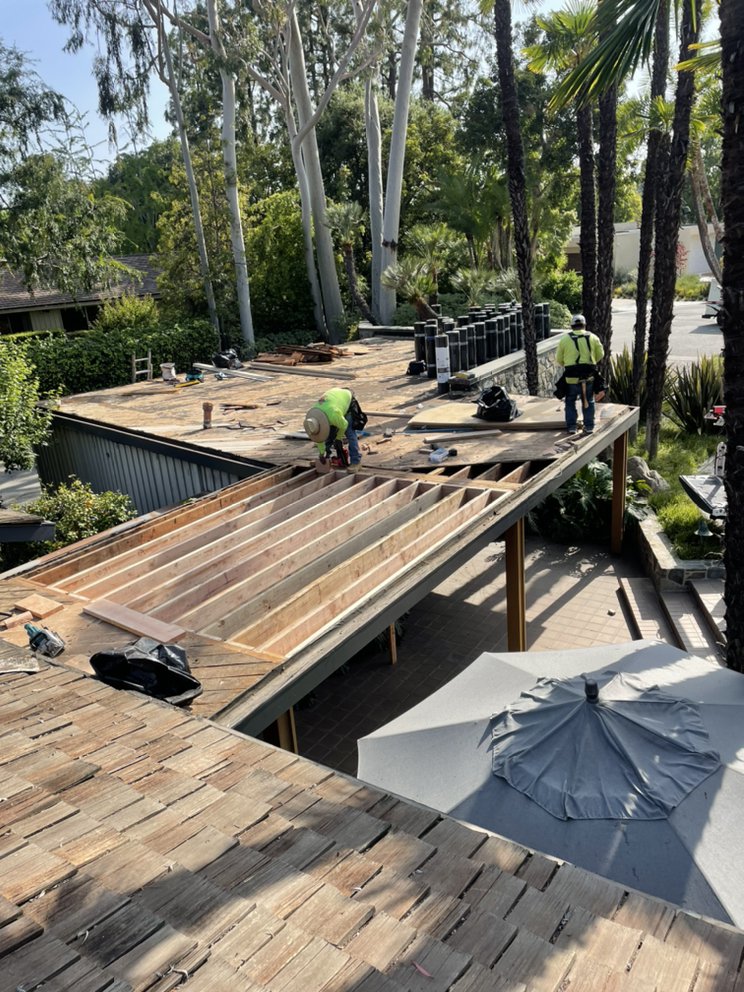 Slide of New Village Roofing