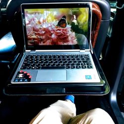 Top Cruise Limousine Service - Many clients of ours utilize the workspace in our Executive L to get some work done and use the time in the car to their benefit.