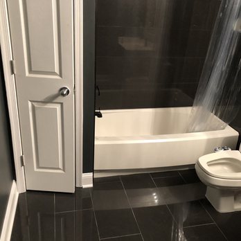 Alcon Renovation - New tiles, shoe molding - Painters Near Me