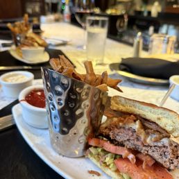 Split a burger - $16 on Thursday w an up charge for the French Fries (worth it) Split a burger - $16 on Thursday w an up charge for the French Fries (worth it)