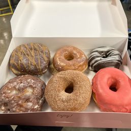 Biscoff, glazed, chocolate dipped, apple fritter, cinnamon sugar, And strawberry. Biscoff, glazed, chocolate dipped, apple fritter, cinnamon sugar, And strawberry.