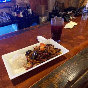 Happy Fish - Saltado de Mariscos - Peruvian Near Me - Tampa, Florida Happy Fish - Saltado de Mariscos - Peruvian Near Me - Tampa, Florida