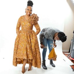 Tawni Haynes Apparel - Designer Tawni Haynes working with client to make sure the garment is perfect!