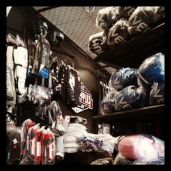 MMA Top Supplies - MMA Top Supplies store picture of gloves and shin guards