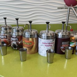 Menchie's Frozen Yogurt - Battle Ground - The end of the toppings area has various sauces
