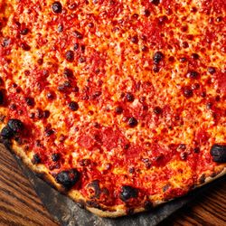 Sally's Apizza - Famous for our distinctive tomato sauce and chewy, crispy crust with an iconic oven-kissed char.