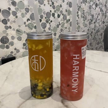 Harmony Tea Shoppe - Watermelon signature drink and a custom made green tea drink with passion fruit pieces and boba pearls - Bubble Tea Near Me - Indianapolis, Indiana Harmony Tea Shoppe - Watermelon signature drink and a custom made green tea drink with passion fruit pieces and boba pearls - Bubble Tea Near Me - Indianapolis, Indiana