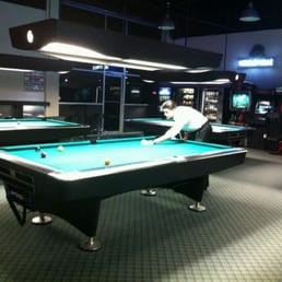 a man playing pool