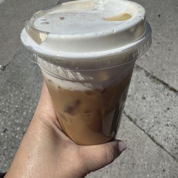 Yia Caffe - Iced latte with roasted hazelnut , almond milk, and sweet cream. - Coffee & Tea Near Me - Los Angeles, California