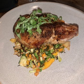 NOMO Kitchen - Bone-in pork chop - New American Near Me - New York, New York