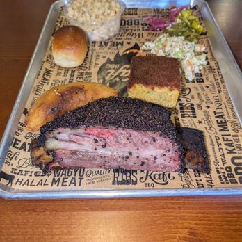 Kafi BBQ - Beef/dino rib, cornbread, empanada, bread roll, mac n cheese, coleslaw, pickled onions, pickles - Barbeque Near Me - Irving, Texas Kafi BBQ - Beef/dino rib, cornbread, empanada, bread roll, mac n cheese, coleslaw, pickled onions, pickles - Barbeque Near Me - Irving, Texas