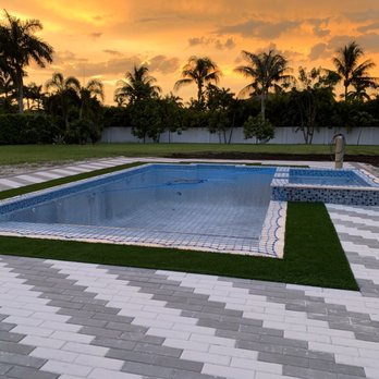Calypso Pools Construction - a pool in a backyard - General Contractors Near Me - Miami, Florida Calypso Pools Construction - a pool in a backyard - General Contractors Near Me - Miami, Florida