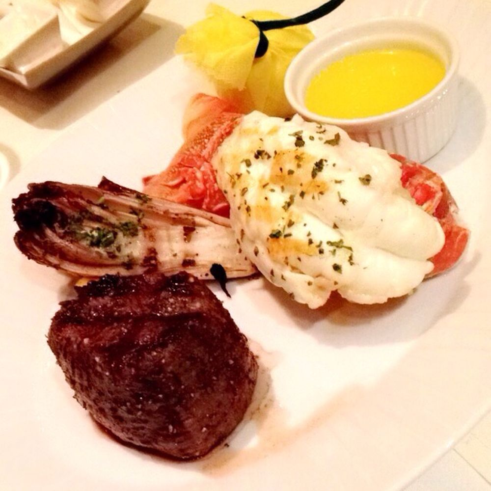 Henry's Steakhouse - Surf and Turf.... 8oz filet mignon w/ half-pound lobster tail. Satisfaction to the max - Steakhouses Near Me - Placerville, California Henry's Steakhouse - Surf and Turf.... 8oz filet mignon w/ half-pound lobster tail. Satisfaction to the max - Steakhouses Near Me - Placerville, California