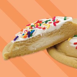 Soft, buttery cookie, typically sugar-cookie based, bursting with colorful rainbow sprinkles.