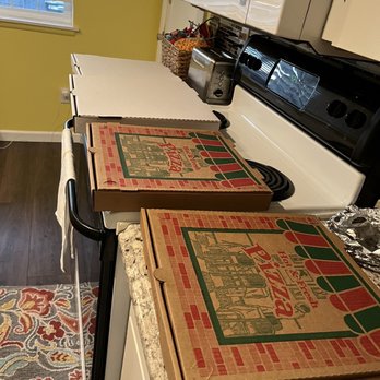 Abella Pizzeria - White boxes are large, brown are medium. - Pizza Near Me - Tacoma, Washington Abella Pizzeria - White boxes are large, brown are medium. - Pizza Near Me - Tacoma, Washington