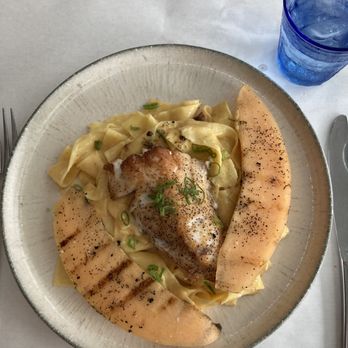 The SaltBox Cafe - Delicious tilefish flanked by grilled melon on pappardelle pasta with chipotle orange cream sauce - New American Near Me - Kill Devil Hills, North Carolina The SaltBox Cafe - Delicious tilefish flanked by grilled melon on pappardelle pasta with chipotle orange cream sauce - New American Near Me - Kill Devil Hills, North Carolina