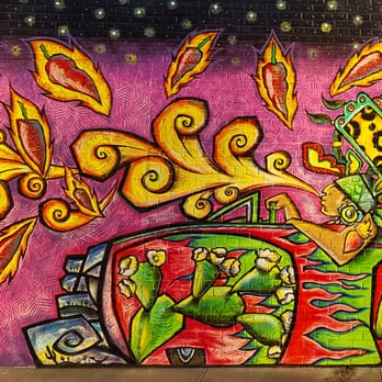 Otro Cafe - Admire this commissioned piece by El Moises from the window seat while you anxiously await the arrival of your meal. - Mexican Near Me - Phoenix, Arizona Otro Cafe - Admire this commissioned piece by El Moises from the window seat while you anxiously await the arrival of your meal. - Mexican Near Me - Phoenix, Arizona