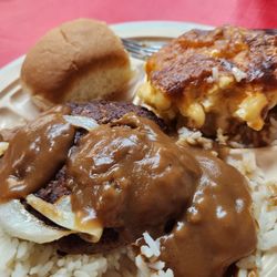 J D's Place - Smothered hamburger with mac and cheese, rice and a roll.