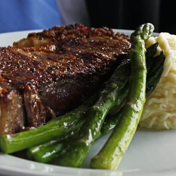 The Eagle's Nest - Prime Rib, asparagus and potatoes - American Near Me - Indianapolis, Indiana