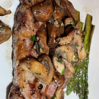 Minervas Restaurant - Sioux Falls - SOUTH DAKOTA BISON RIBEYE with cognac glazed wild mushrooms - New American Near Me - Sioux Falls, South Dakota
