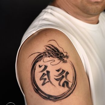 KaHo inkshop - New piece with two Bonji surrounded by a dragon. - Tattoo Near Me - Los Angeles, California KaHo inkshop - New piece with two Bonji surrounded by a dragon. - Tattoo Near Me - Los Angeles, California