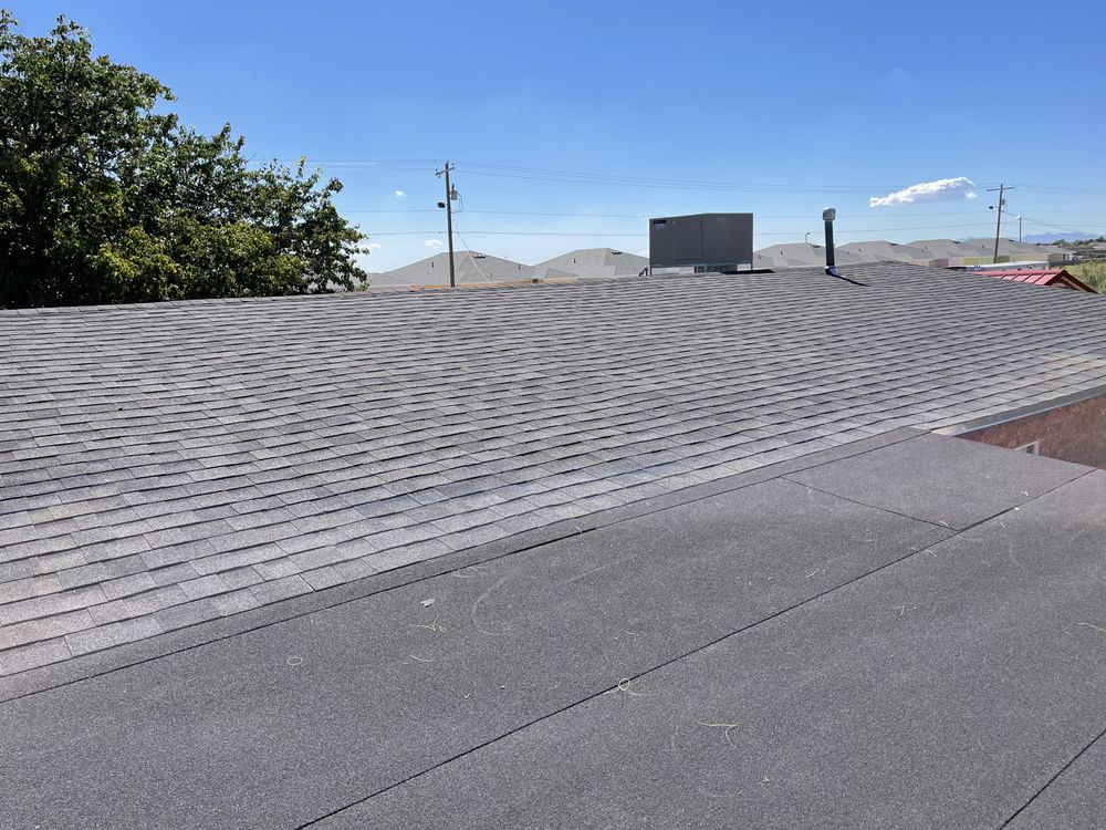 Slide of Grey Bird Roofing