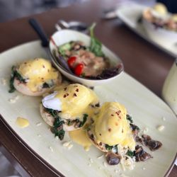 Zisters - The flight of Benedict's with a side salad.