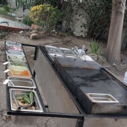 a line of food being prepared