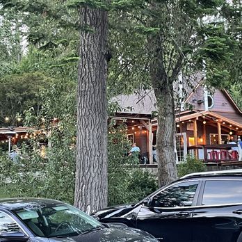 Embers By The Lake - a couple of cars parked in front of a restaurant - Pizza Near Me - Hauser, Idaho Embers By The Lake - a couple of cars parked in front of a restaurant - Pizza Near Me - Hauser, Idaho